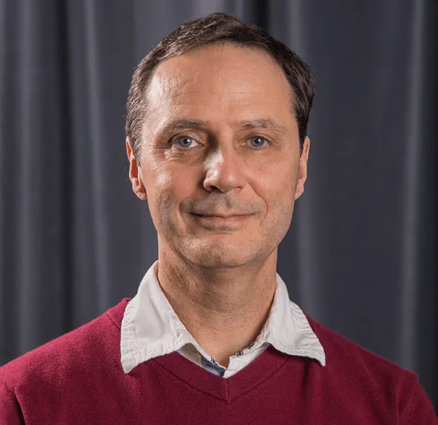 headshot of Dr. Jean Depuis