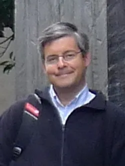 headshot of Dr. William Trischuk