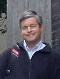 headshot of Dr. William Trischuk