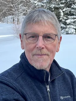 headshot of William Mackey